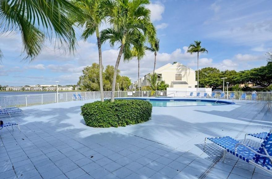 Invested opportunity! Rented for $2,100 unil March 2026. Investor friendly gated complex.  Close to I-95 Close to a new development Live Oak and the Pink Stadium! 15 minutes from the beach  Gated. Best lakes view in Oakland Park. This 2-bed 2-bath amazing spacious well lit  in excellent condition in one of the best areas in the complex. It is a first floor unit .  It has a washer and dryer inside the unit. It has a cozy interior with tile and wood laminated floors, a fully equipped remodeled kitchen. Don't miss in this income producing company. Investor friendly. Plenty of parking Plenty of amenities with a pool with the lake front, jacuzzi, gym and club house.Send your offer today!