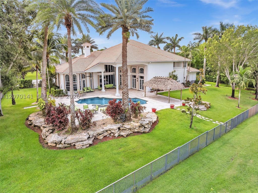 Photo of 3828 Pine Lake Dr, Weston, FL 33332 (MLS # A12070141)