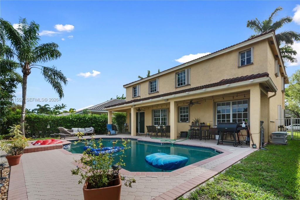Photo of 1095 Chenille Cir, Weston, FL 33327 (MLS # A12011552)
