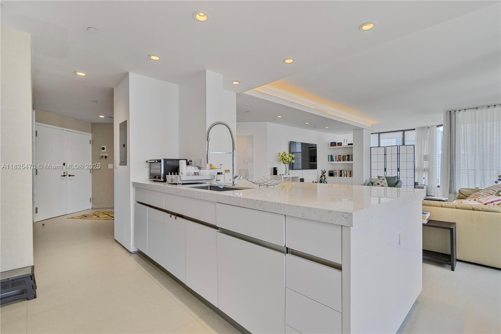 Exceptional 3BD/3BA in exclusive Brickell Key — fully renovated with exquisite taste and attention to detail. This bright and spacious residence features impact windows, high-quality finishes, and abundant natural light throughout. The thoughtfully designed layout includes a dream kitchen perfect for a family, a generous open-concept living space, a large laundry room, and a separate pantry.
Additional highlights include semi private access elevator, 1 assigned parking space,, storage unit, and access to top-tier amenities at Brickell Key One: 24-hour security, bayfront walking path, resort-style pool, jacuzzi, tennis and basketball courts, fitness center, BBQ area, party room, kids’ playroom, pet area, and valet service.