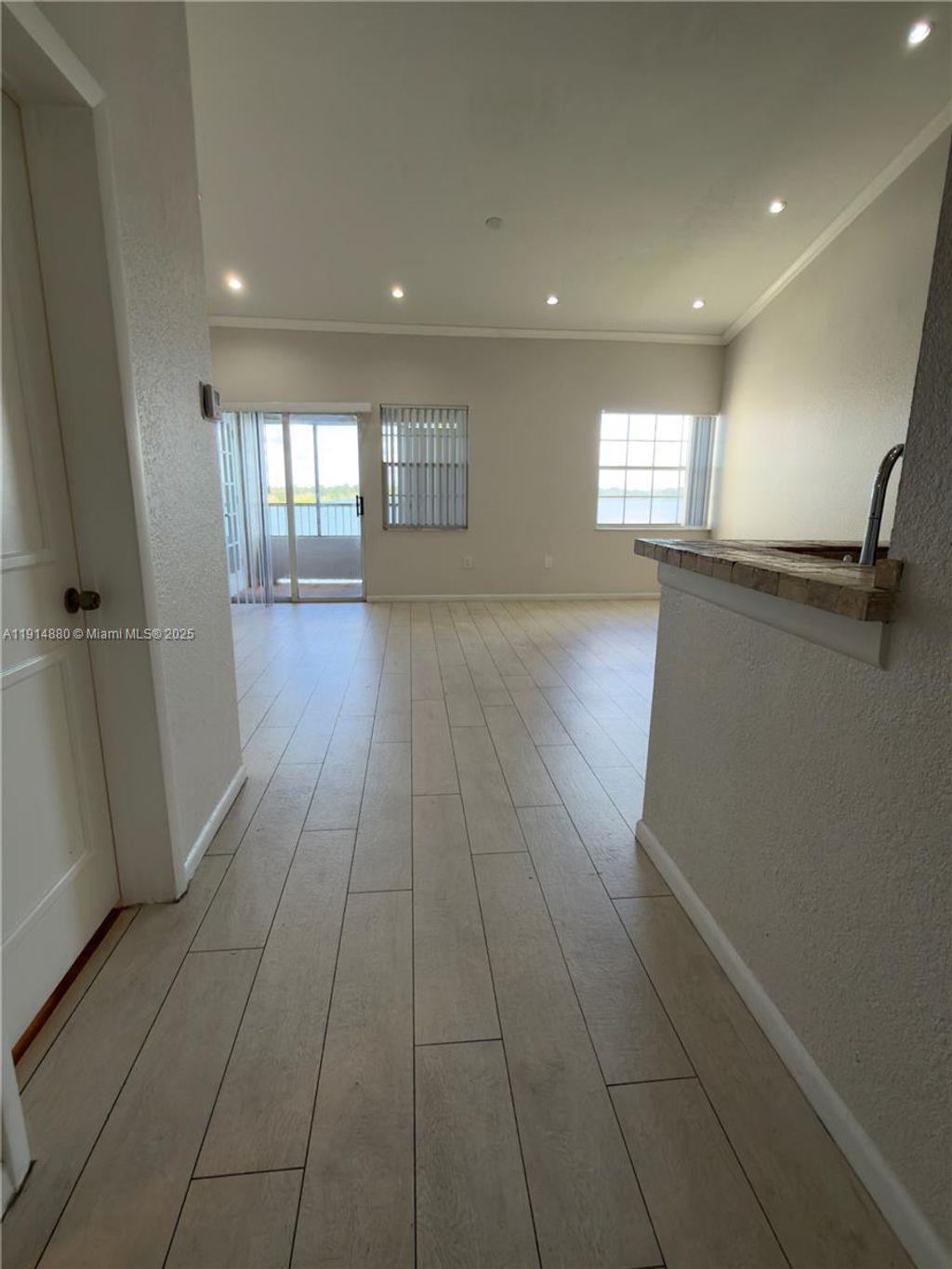 Photo of 2831 N Oakland Forest Dr #304, Oakland Park, FL 33309 (MLS # A11914880)