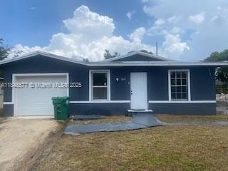 Spacious 4/2 single family house, all tiled, central ac, bathrooms recently updated. Open concept living/dining room. Only first and security needed.