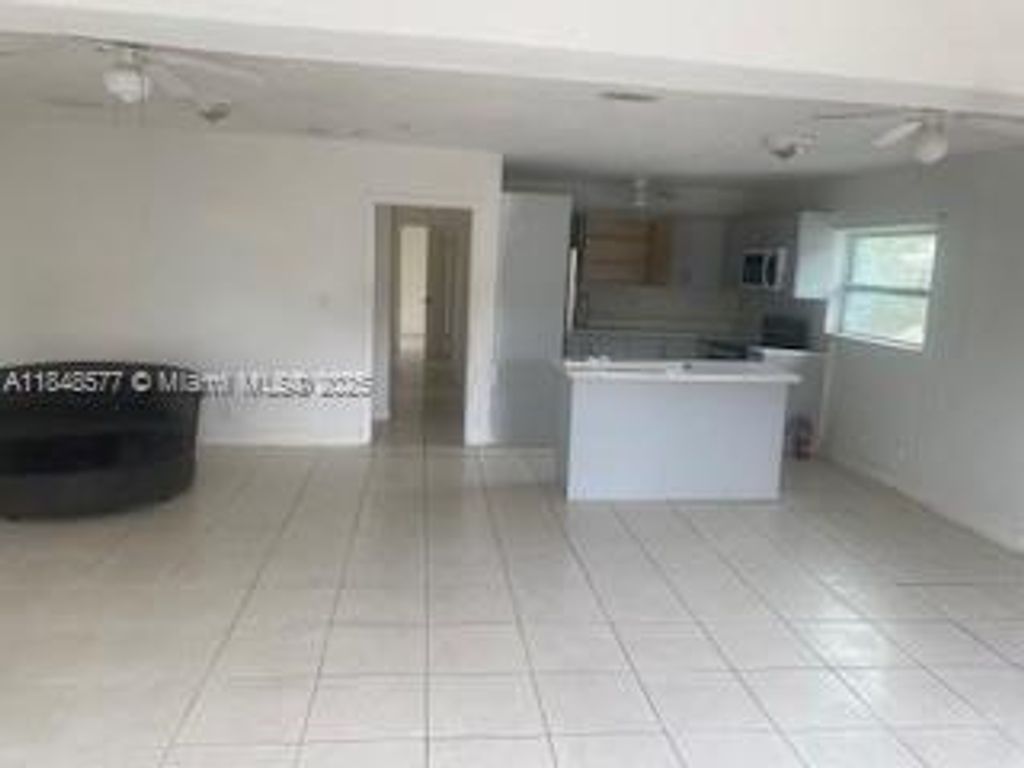 Photo of 2561 NW 14th Ct, Fort Lauderdale, FL 33311 (MLS # A11848577)