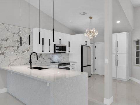 Photo of 7889 Lake Sands Dr, Delray Beach, FL 33446 (MLS # A11878750) Photo of 7889 Lake Sands Dr, Delray Beach, FL 33446 (MLS # A11878750)