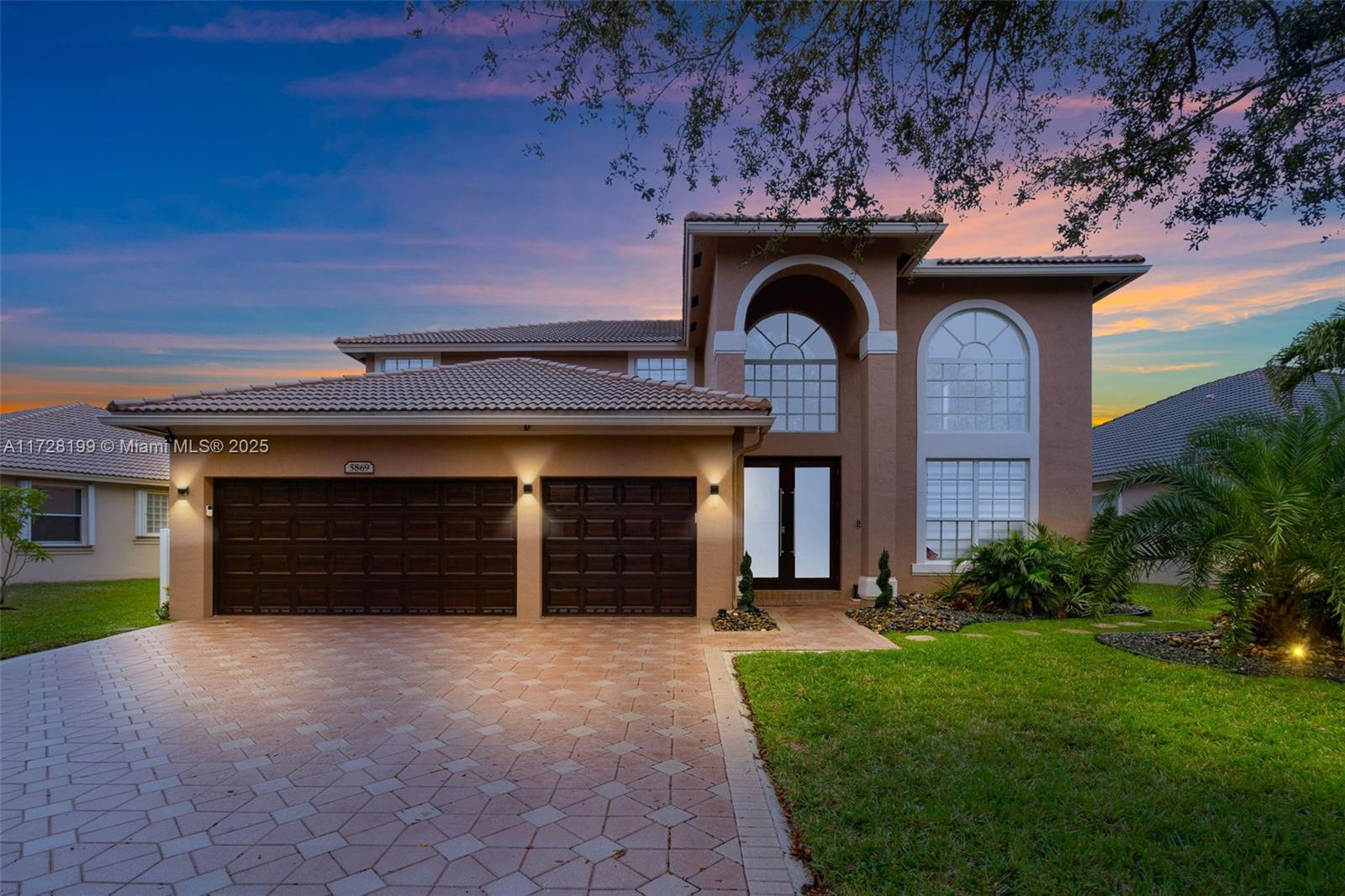 Welcome to your dream home in Grand Reserve in Coral Creek, one of the largest models in the community! This stunning residence features a primary master suite on the first floor and a mini-master upstairs, perfect for multi-generational living. Nestled near Parkland and Coconut Creek, it offers custom impact French doors, 40x40 marble flooring, luxury vinyl upstairs, and a chef’s kitchen with Sub-Zero appliances, a water filtration system, and a reverse osmosis system at the kitchen sink. Enjoy premium upgrades like a saltwater softener, tankless water heater, impact windows and doors, a cozy fireplace, a heated pool, smart home technology, tropical landscaping, a security system, and a garage screen enclosure. Don’t miss out—schedule your showing today!