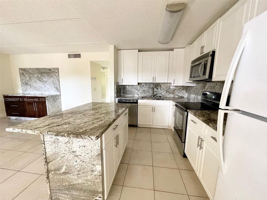 BEAUTIFULLY REMODELED FIRST FLOOR UNIT. OPEN KITCHEN WITH COOKING ISLAND AND GRANITE
COUNTERTOP, RENOVATED BATHROOM, FIXED TV STAND CABINTES WITH GRANITE FEATURES, NO CARPET, TILE
IN THE ENTIRE UNIT, WASHER AND DRYER INSIDE... READY TO MOVE IN! THIS UNIT WILL NOT LAST... GATED
COMMUNITY, WITH POOL, TENNIS AND FITNESS CENTER. CLOSE TO TURNPIKE, I-95 & SEVERAL MALLS AND
RESTAURANTS IN THE CENTER OF BOYNTON BEACH!