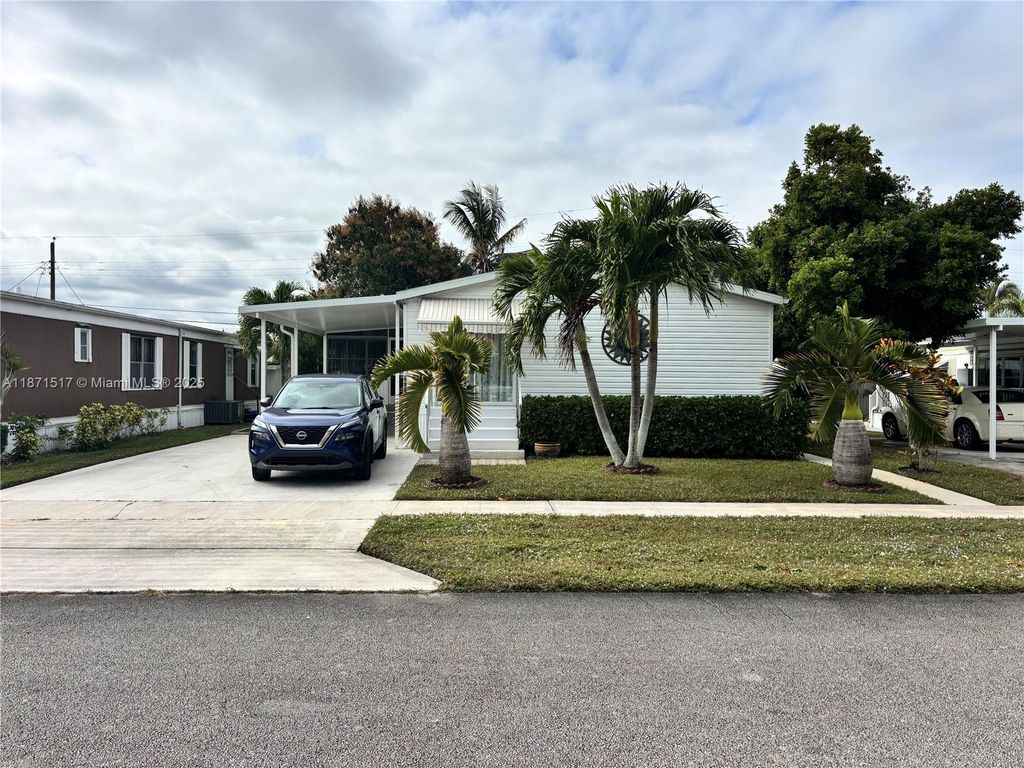 Photo of 4057 Bougainvillea Rd, Boynton Beach, FL 33436 (MLS # A11871517)
