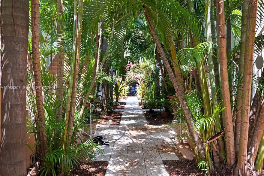 600 sqft 1 bedroom 1 bathroom ground-floor oasis located in a gated community on beautifully tree-lined Meridian Avenue, directly across from Flamingo Park. Perfectly positioned in the heart of South Beach, just minutes from the ocean, top-rated restaurants, coffee shops, grocery stores, and all the best local hotspots.  This updated unit offers a comfortable and functional layout featuring tile floors throughout, an open kitchen with island, and a spacious walk-in closet. Enjoy the convenience of two A/C units and a versatile space ideal for a home office.  Offered turnkey or partially furnished, with select furniture pieces available for sale — making it an excellent option for both end-users and investors.  A rare opportunity to enjoy Miami Beach living in a serene, park-side setting!