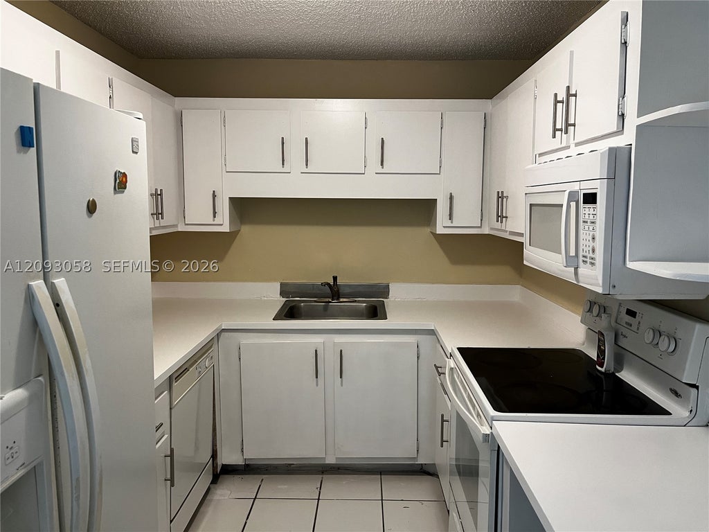 Photo of 3674 NW 111th Ave, Sunrise, FL 33351 (MLS # A12093058)