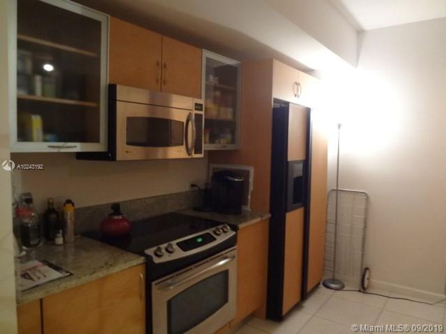 WASHER AND DRYER IN THE UNIT unit at The Venture with porcelain tile flooring throughout---No Carpet This 1 bedroom 1 bathroom furnished unit faces the pool, cabanas & garden area! Tropical courtyard with rec. lap pools, Jacuzzi, gym, cyber cafe, business center & 24 hrs. Concierge. 1 covered parking space & valet. Beautiful building in the heart of Aventura. Near Aventura Mall, beach and restaurants.