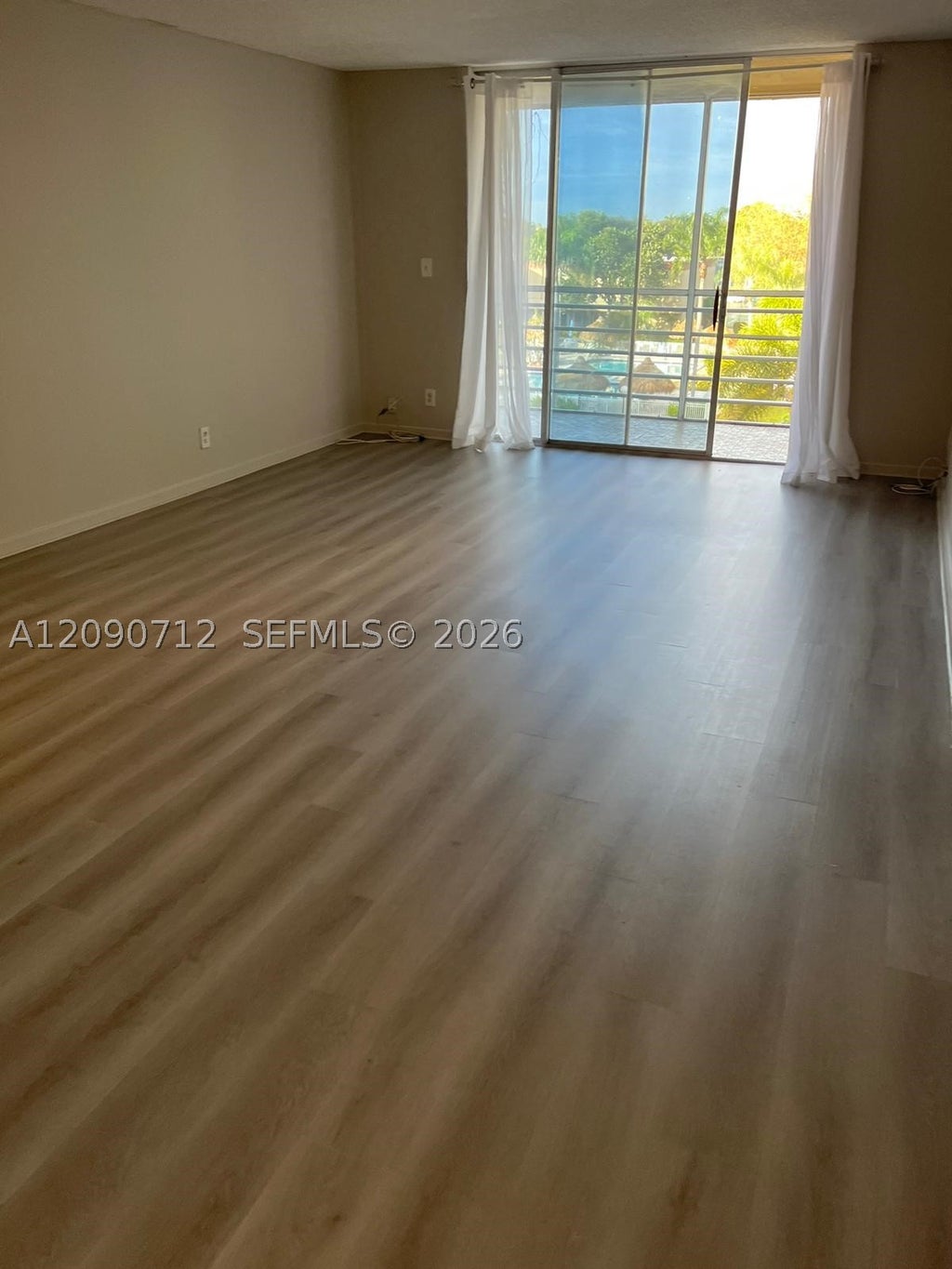 Photo of 406 NW 68th Ave #405, Plantation, FL 33317 (MLS # A12090712)