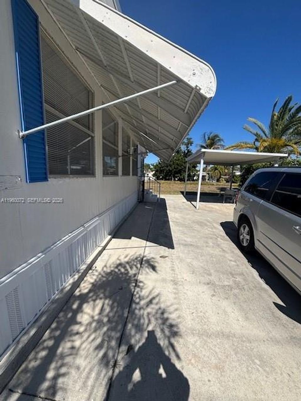 Photo of 4201 Mocking Bird Dr, Boynton Beach, FL 33436 (MLS # A11960072)