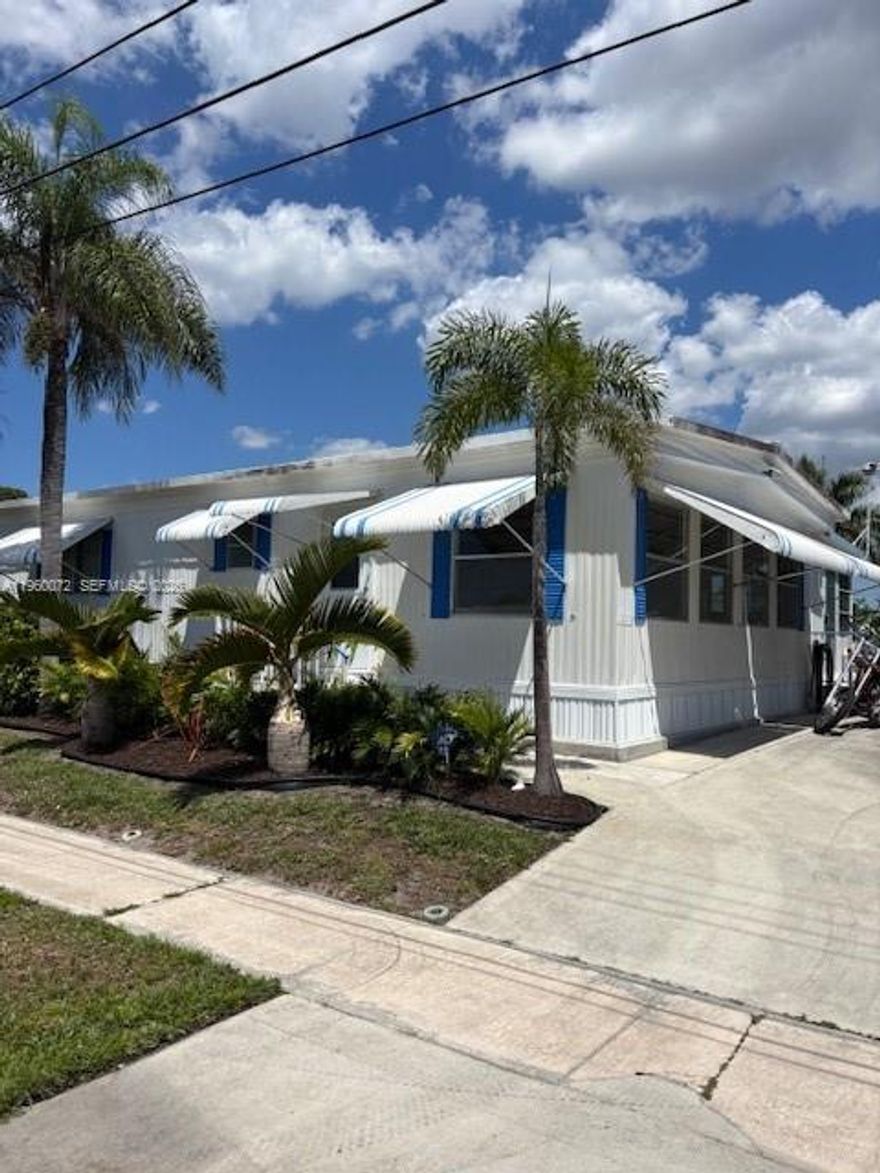 Welcome to 4201 Mocking bird dr– a beautifully maintained manufactured home where you own the land! Ideally located near a scenic water channel, this home offers the perfect blend of tranquility and convenience. Enjoy being just minutes from top-rated restaurants, shopping centers, and surrounded by golf courses. There’s even a dedicated spot for your golf cart—perfect for quick rides around the community or even a scenic trip to the beach! Featuring a gourmet kitchen, spacious layout, and a garage with extra storage space, this home is a true gem. Whether you’re looking for a permanent residence or a coastal getaway, this property has it all