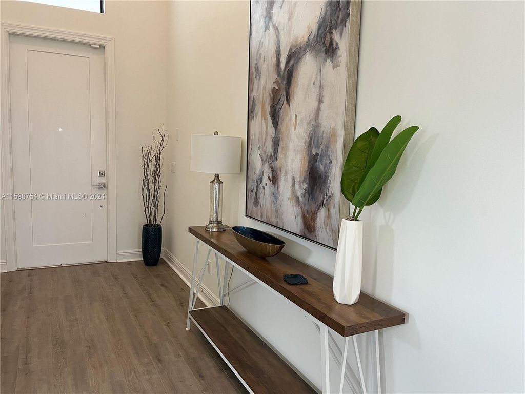 Photo of 9157 SW SW Arco Way, Port Saint Lucie, FL 34987 (MLS # A11590754)