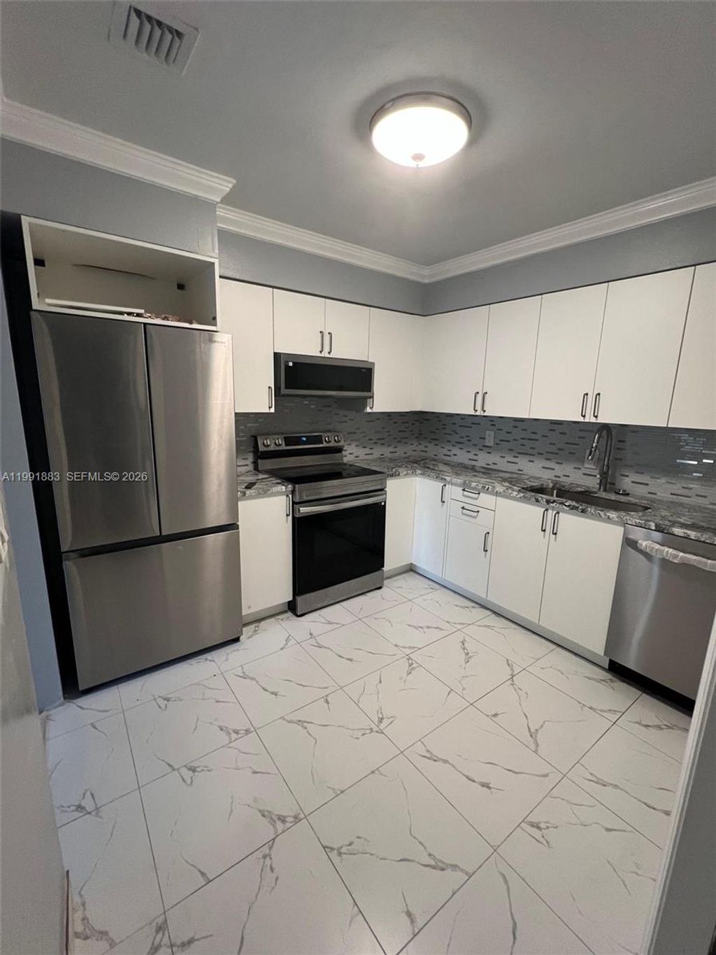 Photo of 6610 Johnson St, Hollywood, FL 33024 (MLS # A11991883)