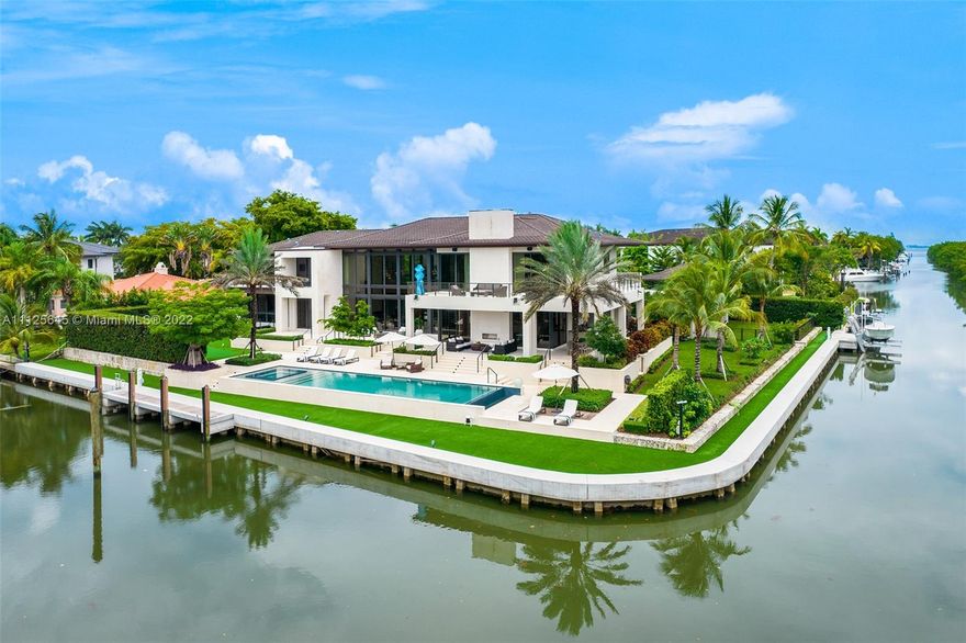 Dream Home with 10,061 SF on a Corner Lot with over 355’ of Waterfront in the Exclusive Gated Community of Old Cutler Bay. Featuring 7 Bedrooms, 7.5 Bathrooms, an Infinity Pool, and a Grand Living Room with Natural Lighting Accentuated by Two Floors of High Impact Windows, creating a Bright Airy and Open Space. Custom Mia Cucina Kitchen and a Spacious Family Room with a beautiful Wine Cellar and Bar. Travertine & Oak floors throughout the interior and an incredible Catwalk leading to the Master Suite with His and Her Walk-In Closet, which overlooks the Open Water. Enjoy a Home Office, Gym, and a Stunning Pool Area with a Covered Summer Kitchen, Gas Fireplace, Whole-House Generator, Wolf & Subzero Appliances, Putting Green, & Lush Landscaping. Bring Your Yacht & Supercars with a 2+2 Garage!
