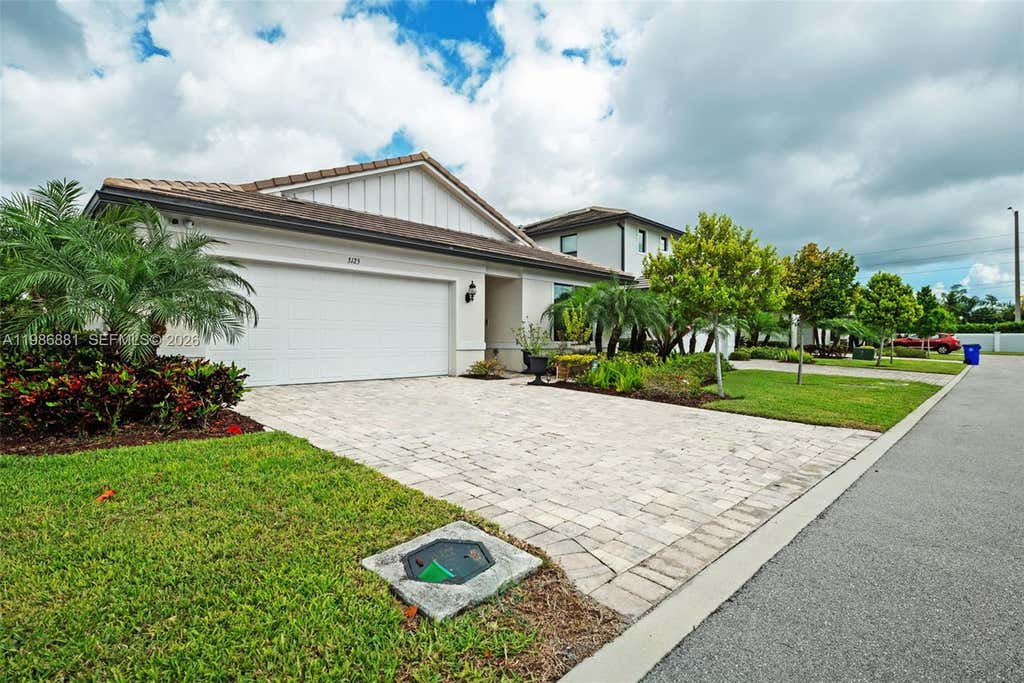 Photo of 3125 Buttonwood Ct, Lauderdale Lakes, FL 33311 (MLS # A11986881)