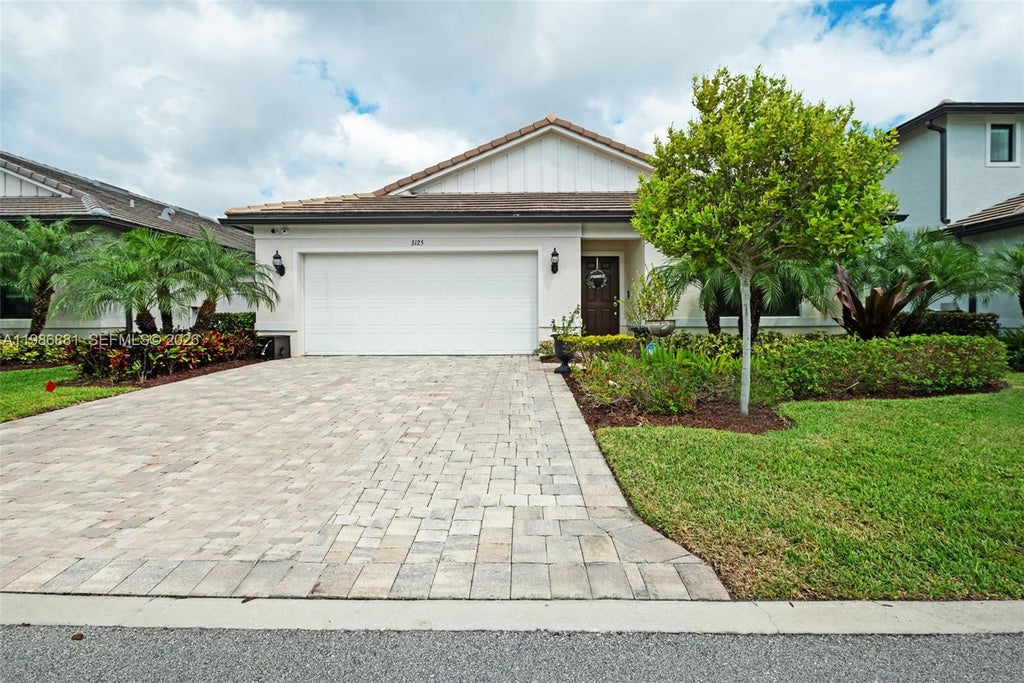 Photo of 3125 Buttonwood Ct, Lauderdale Lakes, FL 33311 (MLS # A11986881)