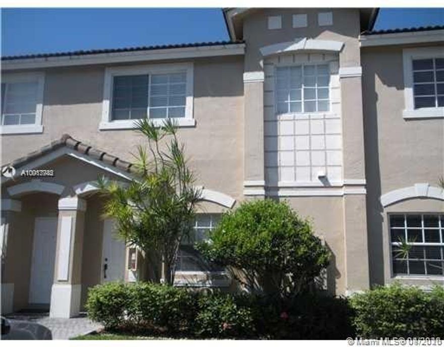 Spacious, well maintained 3 bed 2.5 bath villa located in desirable LAS BRISAS.  Open kitchen for entertaining, stainless steel appliances, washer and dryer. brand new water heater, laminate floors.  Excellent gated community with clubhouse, pool, tennis court, gym and more.  Close to all major highways, airport and Dolphin mall.  Easy to show.  A must see.