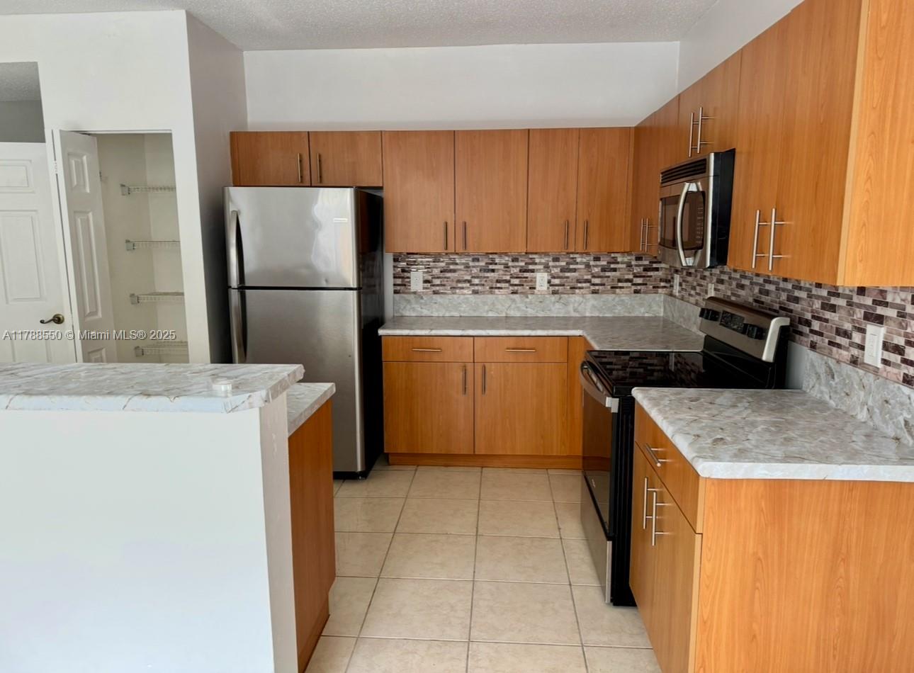 Rental Property at 1033 Ne 42nd Ter 1033, Homestead, Miami-Dade County, Florida - Bedrooms: 3 
Bathrooms: 3  - $2,200 MO.