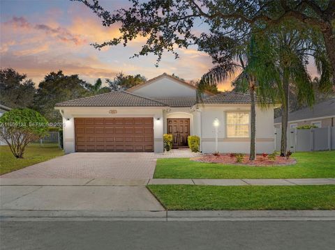 Photo of 1861 NW 142nd Ter, Pembroke Pines, FL 33028 (MLS # A11959123)