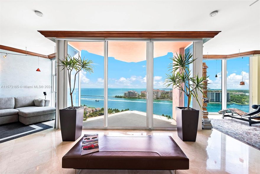 Step into luxury living at Portofino Tower in the world renowned South of Fifth neighborhood. This custom 2-BEDROOM + DEN flow-through architectural gem in the coveted '04' line boasts an open floor plan & breathtaking unobstructed views of the Government Cut, Fisher Island, South Pointe Park & majestic Atlantic Ocean. Enjoy the spectacle of yachts & cruises passing by & the colorful lights of the cityscape at night from two spacious balconies. Perched at the perfect elevation, immerse yourself in the serenity of waterfront living while still feeling connected to the vibrant energy of South Beach. Portofino has a new lobby, new elevators, new pool, tennis/pickleball/basketball courts, dog parks & amenities to be completed soon include a 2nd pool, BBQ areas, serenity garden & porte cochére