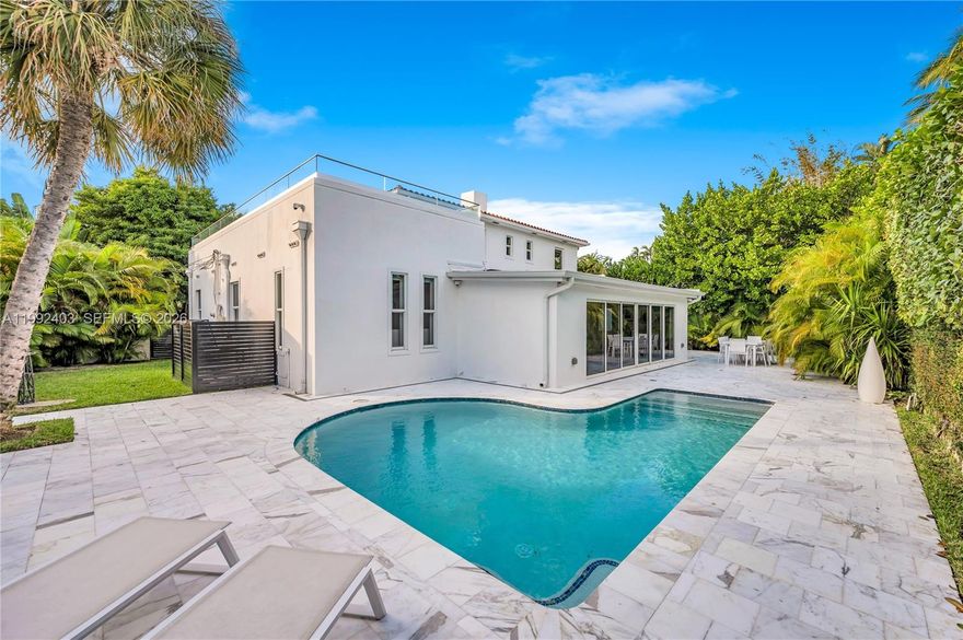 Move right in—just bring your furniture and personal belongings. This fully completed residence is truly turnkey and ready to be enjoyed from day one.

Located in a peaceful, family-friendly Miami neighborhood with a strong sense of community, the home offers convenient access to parks, top-rated schools, and everyday essentials—while remaining just minutes from the water, beaches, and Miami’s finest dining and entertainment.

Originally built with solid concrete construction, the property has been completely rebuilt to near new-construction standards, retaining only the original concrete walls. Every detail has been thoughtfully reimagined, featuring a redesigned floor plan and a full reconstruction with high-end materials and modern systems throughout.

Exceptional finishes include Carrara marble flooring seamlessly extending from interior to exterior, custom Italian concealed doors, premium countertops, a striking designer staircase, and top-of-the-line appliances.

Major upgrades include a brand-new roof, resurfaced pool, and a newly built terrace deck—perfectly blending indoor and outdoor living.

Additional highlights feature electric screens and blinds, full crawl-space encapsulation, and a flood-prevention pump system—offering both comfort and peace of mind.

A truly one-of-a-kind residence that must be experienced in person to be fully appreciated.