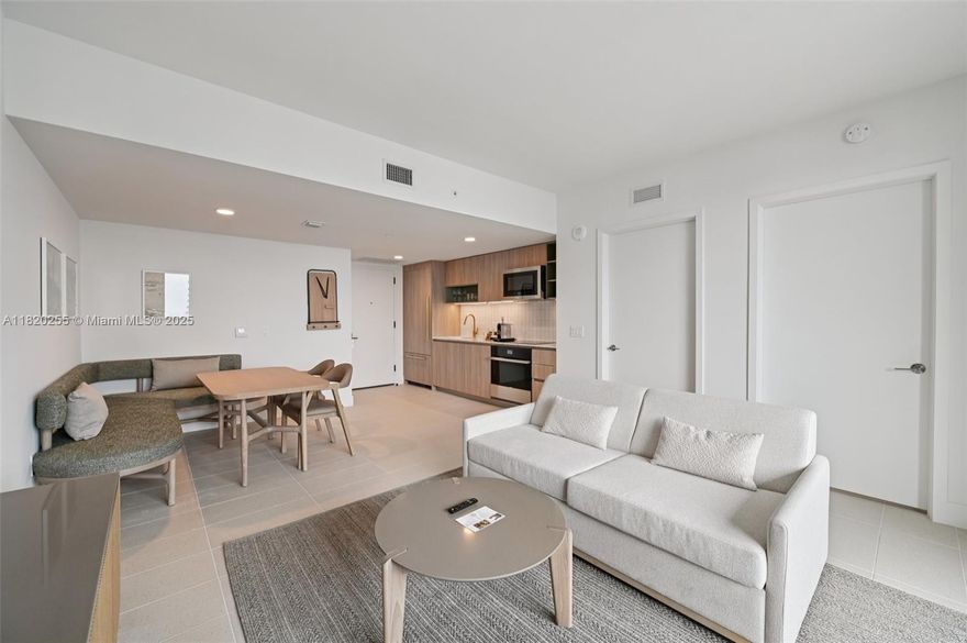 Discover Unit 4409 at Natiivo Miami, a fully furnished, move-in-ready 1 bedroom, 1 bathroom residence offering 912 sq ft of bright, open living space. Perched on a high floor, this spacious unit features floor-to-ceiling impact windows, a sleek open layout, and a private balcony with stunning views of Biscayne Bay and the Miami skyline. It’s approved for short-term rentals (Airbnb/VRBO), making it a great fit for both personal use and investment. Natiivo offers over 70,000 sq ft of resort-style amenities, including a rooftop pool, state of the art gym, yoga lounge, co-working areas, and on-site dining, all in the vibrant heart of Downtown Miami.