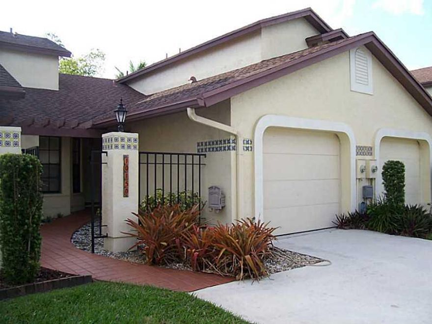 You won't be disappointed. Security gated Valencia Townhomes. 2 story with open loft on the 2nd level. First floor tile flooring, loft has wood flooring, stairs new carpeting. Complete storm shutters, new dishwasher, oven-range, disposal, new wood fence.  Garage door upgraded. Show with confidence.