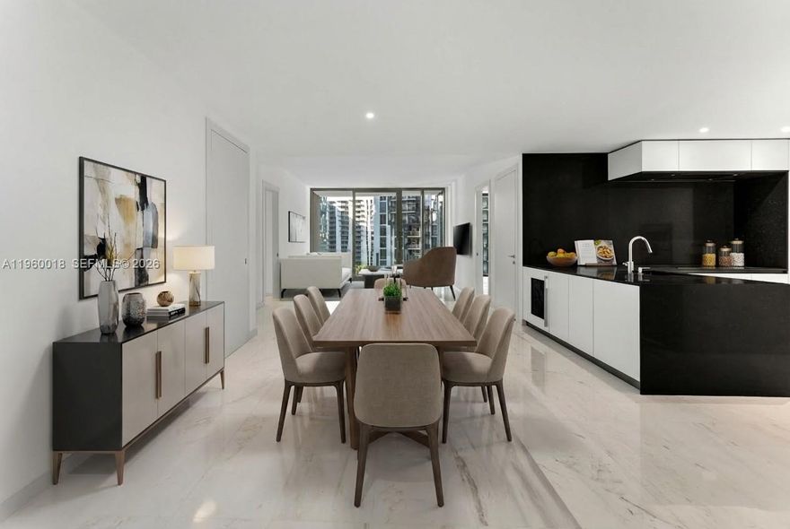 Experience refined waterfront living in the iconic Aston Martin Residences. This 20th-floor, 2BR/2.5BA luxury residence spans 1,578 SF of light-filled interior space with floor-to-ceiling glass showcasing Biscayne Bay and city skyline views. Features include elegant marble flooring, custom finishes, and a private balcony for breathtaking sunrises.

Enjoy world-class amenities across multiple sky levels: a resort-style infinity pool, elite spa/wellness center, fitness center, cinema, virtual golf, and 24-hour concierge. Includes valet and exclusive marina access. Ideally located in downtown’s DuPont Plaza, minutes from Brickell and fine dining. Own a piece of an architectural landmark in Miami’s most prestigious new tower