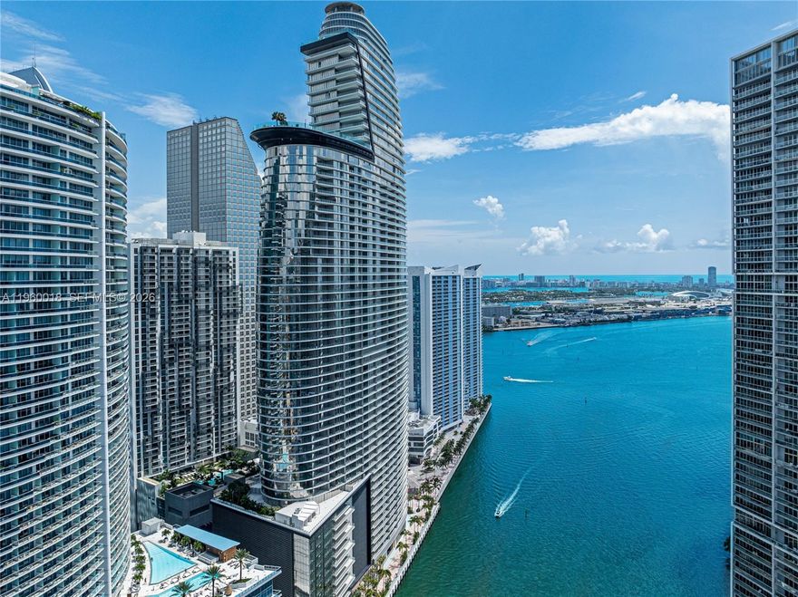 Experience refined waterfront living in the iconic Aston Martin Residences. This 20th-floor, 2BR/2.5BA luxury residence spans 1,578 SF of light-filled interior space with floor-to-ceiling glass showcasing Biscayne Bay and city skyline views. Features include elegant marble flooring, custom finishes, and a private balcony for breathtaking sunrises.

Enjoy world-class amenities across multiple sky levels: a resort-style infinity pool, elite spa/wellness center, fitness center, cinema, virtual golf, and 24-hour concierge. Includes valet and exclusive marina access. Ideally located in downtown’s DuPont Plaza, minutes from Brickell and fine dining. Own a piece of an architectural landmark in Miami’s most prestigious new tower