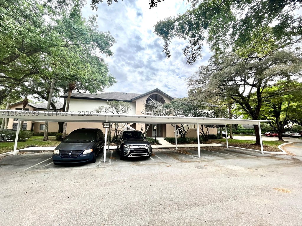 Photo of 9755 Westview Dr #1217, Coral Springs, FL 33076 (MLS # A12059793)