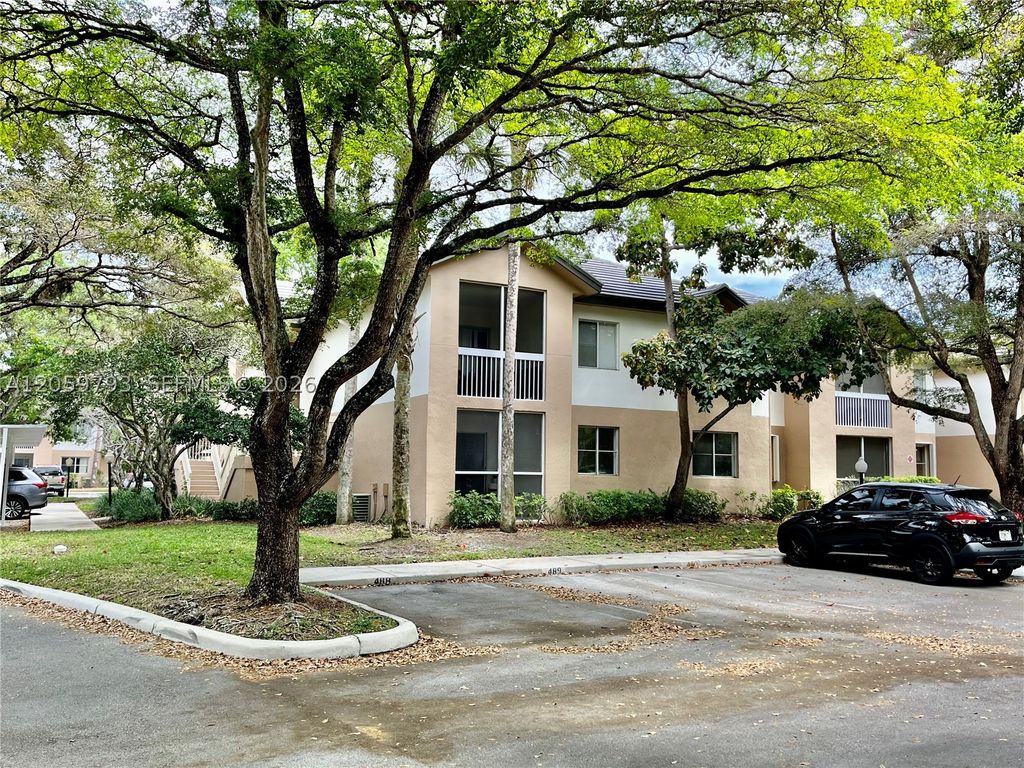 Photo of 9755 Westview Dr #1217, Coral Springs, FL 33076 (MLS # A12059793)