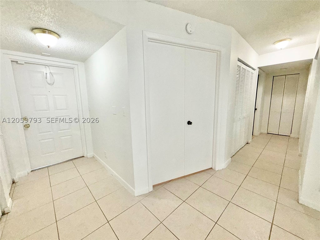 Photo of 9755 Westview Dr #1217, Coral Springs, FL 33076 (MLS # A12059793)
