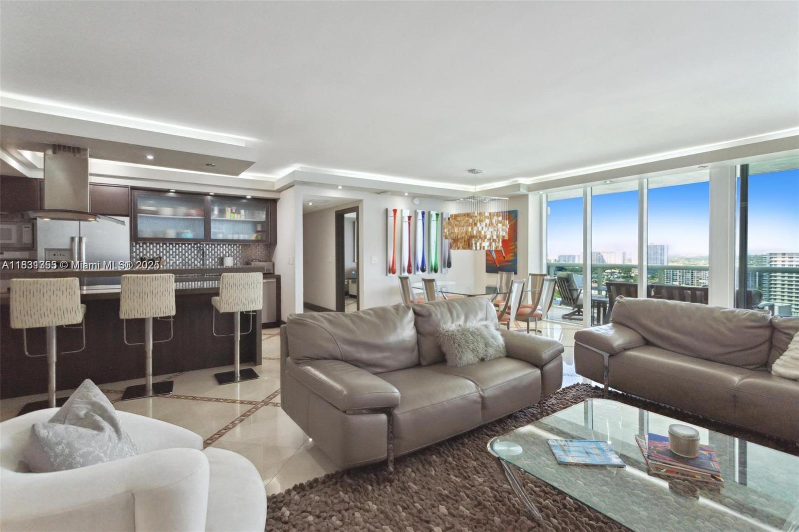 Indulge in unmatched elegance in this 2BD/2BA corner unit, meticulously renovated 1,782 sq.ft.with a 457 sq.ft. wraparound balcony offering breathtaking ocean and Intracoastal views. The unique kitchen showcases quartz countertops and premium appliances. The primary bath features a jacuzzi, separate shower, designer fixtures and complemented by Italian doors, electric shades, recessed lighting and marble floors throughout. Live in luxury with a 5-star condo experience, including a full-time concierge, 24/7 valet parking, and a sprawling 50,000 sq.ft.
Spa and fitness center facing the Atlantic Ocean. Available for a seasonal lease. This property offers the ultimate experience, don't miss your chance to make this stunning home your own!