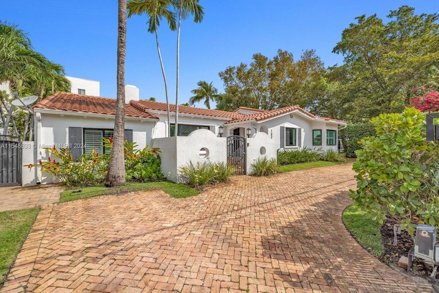 This stunning single-family home boasts luxury and comfort at every turn and is conveniently located minutes away from Brickell, Key Biscayne and Coconut Grove. With four spacious bedrooms and 3.5 bathrooms in the main house, plus a detached 1/1 guest house with a kitchenette, there's plenty of space for family and friends. Enjoy the privacy of a gated entry with ample parking, situated on a beautiful tree-lined street. Vaulted ceilings add an airy ambiance while custom closets provide ample storage. Enjoy a newly built pool, three HVAC units replaced in 2023, updated kitchen appliances and new flat roof. This meticulously maintained property is your ticket to upscale living.