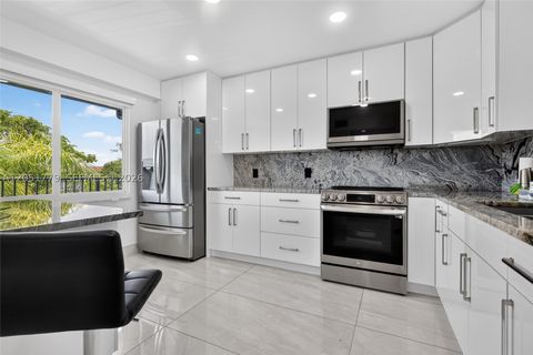 Photo of 1501 SW 134th Way #403D, Pembroke Pines, FL 33027 (MLS # A12051779)
