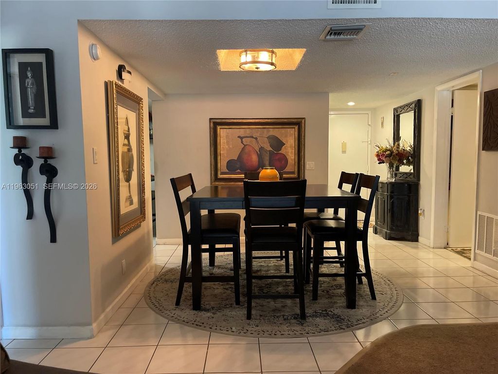 Photo of 16475 Golf Club Rd #309, Weston, FL 33326 (MLS # A11963051)