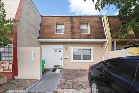 Photo of 5971 NW 24th Ct, Sunrise, FL 33313 (MLS # A11913586)