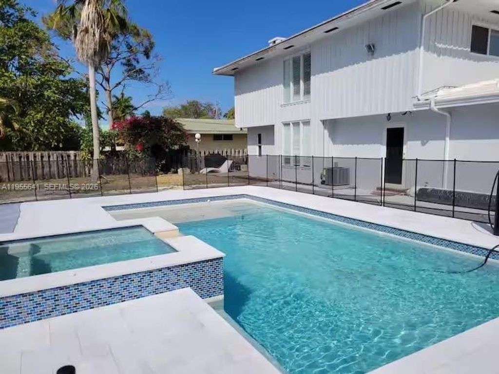 Photo of 63 SE 5th Ave, Deerfield Beach, FL 33441 (MLS # A11955641)