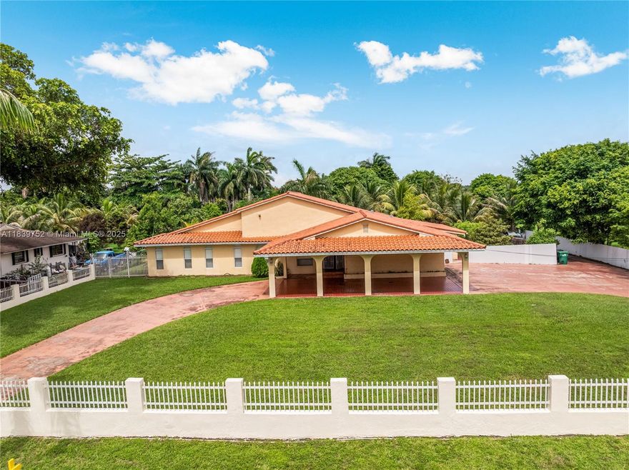 Possible owner financing! Welcome to this spacious and well-maintained home situated on a large 43,281 s/f lot, offering privacy and plenty of room to grow. With 4 comfortable bedrooms and 3 bathrooms spread across 6,180 total s/f, there’s ample space for everyday living. The property features a 2-car garage, porte cochere, and a wide circular driveway that provides plenty of parking for family and guests. The kitchen is equipped with granite countertops, wood cabinetry, and stainless steel appliances, while crown molding adds a nice finishing touch throughout the home. Large backyard offers the potential to add a pool or customize outdoor living areas to your needs. Additionally, there's a separate 1-bedroom, 1-bathroom guest house—ideal for extended family, visitors, or a home office.