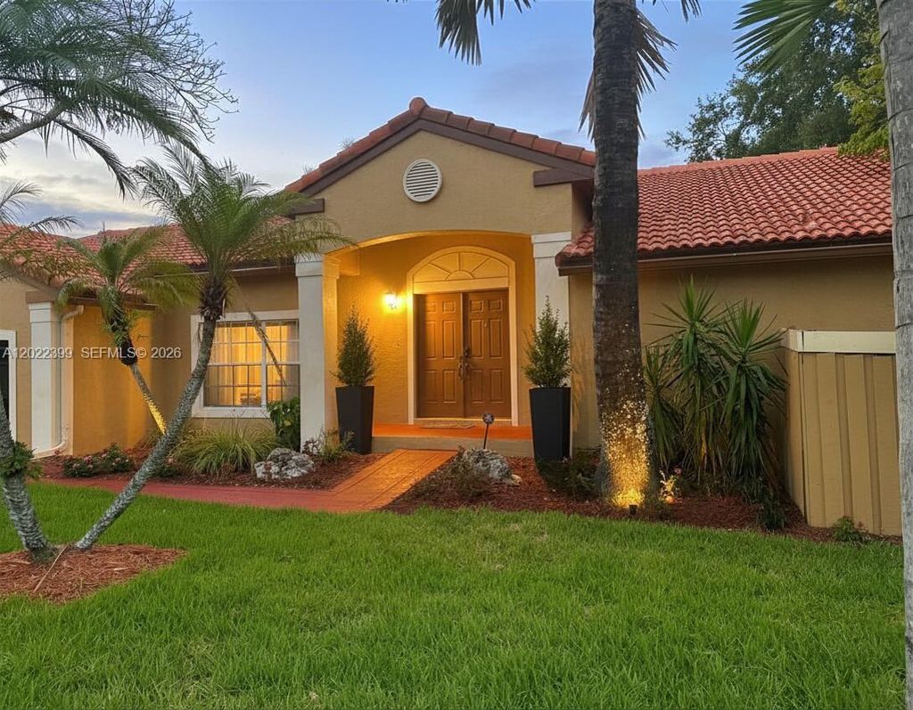Photo of 13313 NW 11th Dr, Sunrise, FL 33323 (MLS # A12022399)