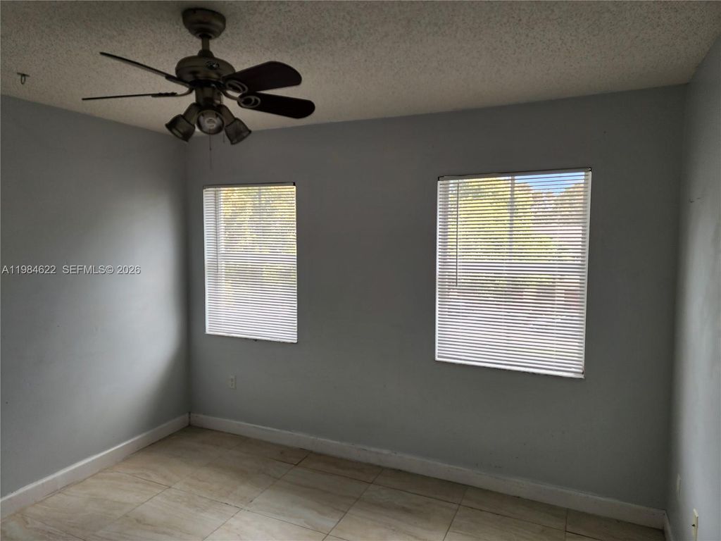 Photo of 2451 Centergate Dr #301, Miramar, FL 33025 (MLS # A11984622)