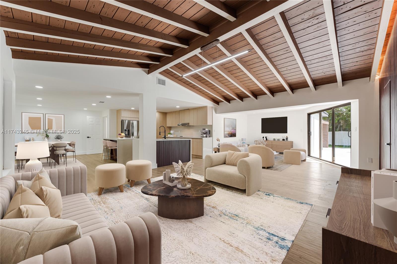 Experience luxury living in this stunning 4-bed, 4-bath home on an expansive 15,000 sqft corner lot in the highly sought-after Coral Reef Estates! This turn-key residence boasts upscale features, including a resort-style pool with a covered grilling station, a fully fenced yard with/ lush mango & avocado trees, cabana bath with/ direct pool access. Modern family room overlooking the pool. Impact windows & doors, chef’s kitchen w/ elegant wood cabinetry, quartz countertops, and high-end SS appliances. Additional highlights include PVC plumbing, a 2018 shingle roof, luxurious bathrooms with premium finishes, a full washer/dryer in the 2-car garage & oversized master suite with custom closet cabinetry. Prime location near top shopping, parks, and attractions!