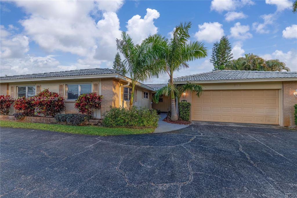 Photo of 225 Gleneagles Dr, Atlantis, FL 33462 (MLS # A12002776)