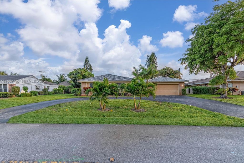 Photo of 225 Gleneagles Dr, Atlantis, FL 33462 (MLS # A12002776)