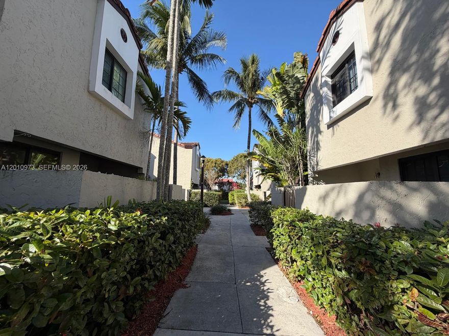 Beautiful 3-bedroom, 2.5-bath corner townhome located in the highly desirable The Hammocks in Kendall. This well-designed layout offers a bright and open living space with all bedrooms privately situated on the second floor, providing comfort and separation from the main living areas. Enjoy the convenience of an in-unit laundry and additional storage, along with the privacy of a pet-friendly community ideal for everyday living. Experience true resort-style amenities with access to a stunning lake featuring sandy beaches, scenic jogging trails, and the full Hammocks lifestyle in addition to Palm Points private pool. A rare opportunity to own a spacious, well-located home with the benefits of single-family financing and exceptional community amenities.
