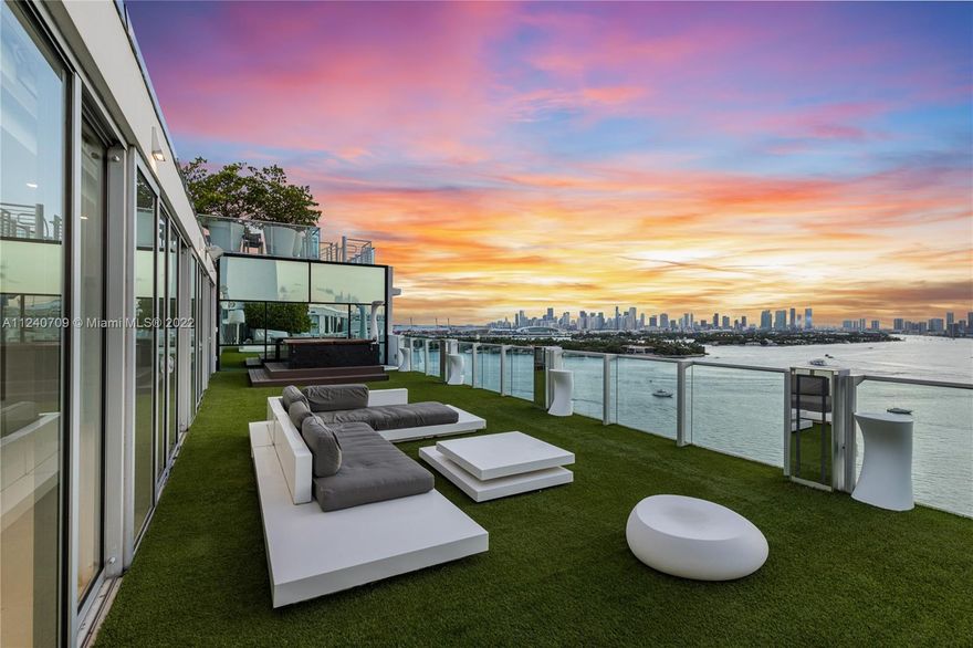 Located in a prime area on West Ave in Miami Beach, this 4,100 SQ FT, 3-bed, 3.5 bath + office combined double penthouse is the largest unit in the building and a symbol of opulence with breathtaking bay, downtown and sunset views. Access the 1,400 SQ FT terrace from the massive open format kitchen, living and dining space, as well as from both master suites and additional bedroom. Every aspect of this condo is luxe, from quality finishings and custom built-ins to Fendi furniture, huge master baths, and top-tier appliances. With a condo hotel program and no rent restrictions, this unit is an investor’s dream. Additional building amenities include a restaurant, bar, pool, waterfront cabanas, watersports for rent, lobby renovation, and close proximity markets, restaurants, and shopping.