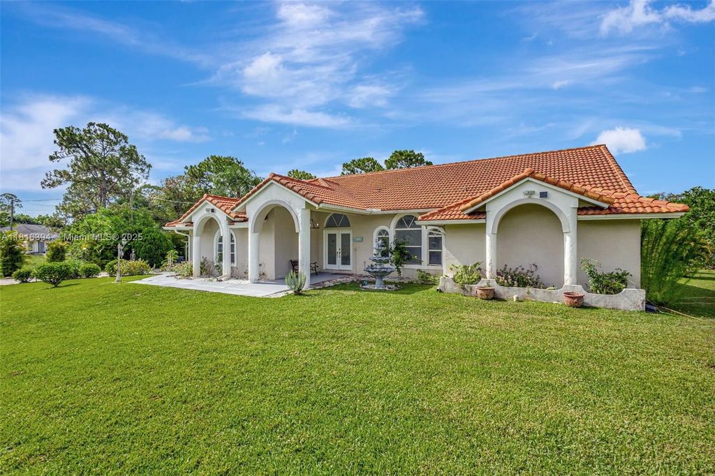 Photo of 17084 N 33rd Rd N, Loxahatchee, FL 33470 (MLS # A11816394)