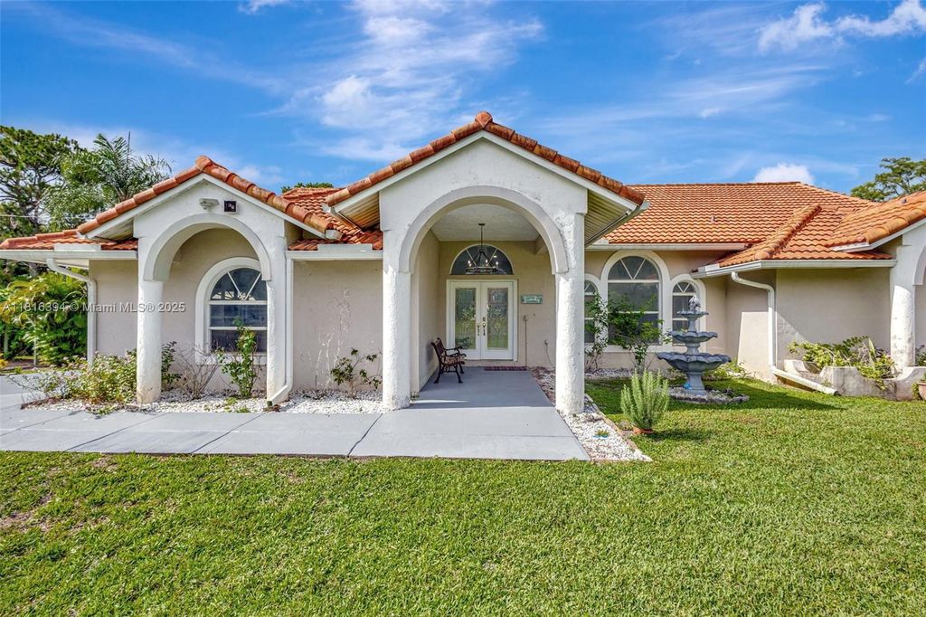 Photo of 17084 N 33rd Rd N, Loxahatchee, FL 33470 (MLS # A11816394)